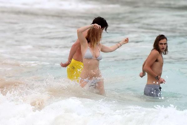 16P Alice Eve slipping out of her skimpy striped bikini on a beach in Barbados