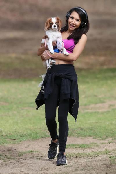 16P Naya Rivera wearing sports bra and tights while walking her dog at Griffith Park