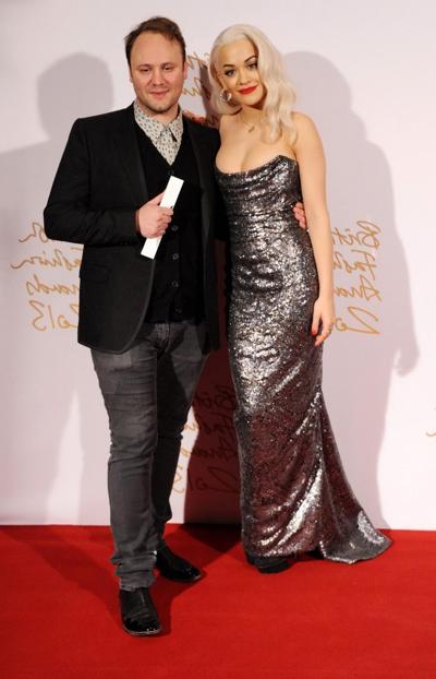 16P Busty Rita Ora wearing a strapless maxi dress at the 2013 British Fashion Awards