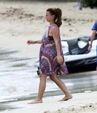 16P Coleen Rooney showing off her plump bikini body on a beach in Barbados