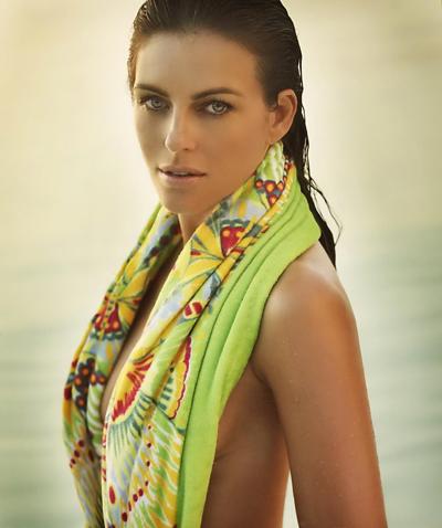 16P Elizabeth Hurley topless but hiding her precious assets at some old bikini photo