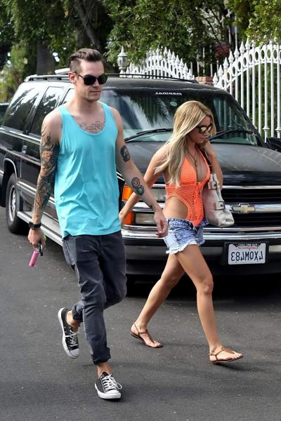 16P Ashley Tisdale wearing skimpy orange monokini and hotpants out in Los Angeles