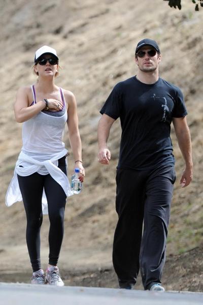 16P Kaley Cuoco wearing transparent tank top and tights while hiking on Hollywood Hi