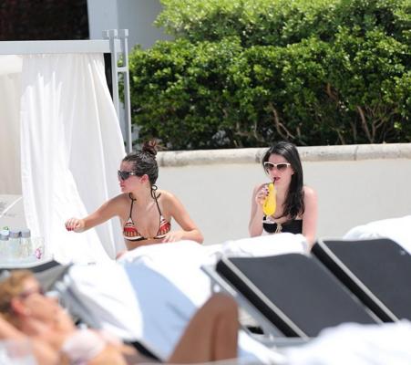 16P Selena Gomez showing off her bikini body poolside in Miami