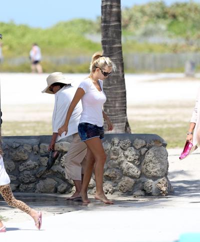 16P Luisana Lopilato in hotpants  c-thru T-shirt strolling down Miami Beach