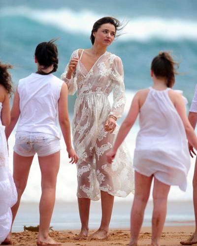 10P Miranda Kerr flashing her pussy in see through panties at the Kora Organics phot