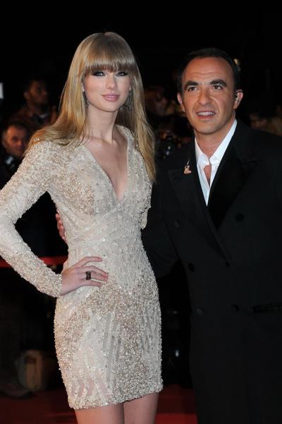 10P Taylor Swift leggy wearing a mini dress at 2013 NRJ Music Awards in Cannes