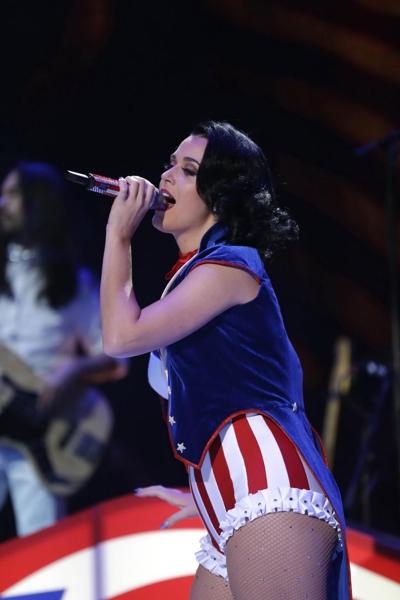 10P Katy Perry busty and leggy wearing skimpy national colored costume at a concert 