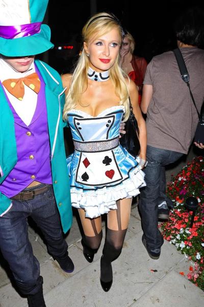 10P Paris Hilton dressed as Alice in Slutland for a Halloween party in Beverly Hills
