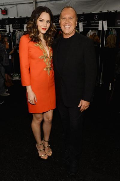 10P Katharine McPhee leggy  cleavy wearing an orange dress at Michael Kors Spring 20