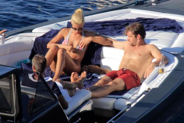 10P Michelle Hunziker wearing a thong bikini on a yacht in Elba