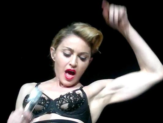 10P Madonna performing in bra  showing boob on her 2012 MDNA World Tour