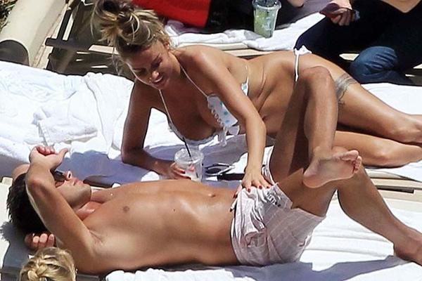 10P Katie Price giving hand job to her boyfriend on beach