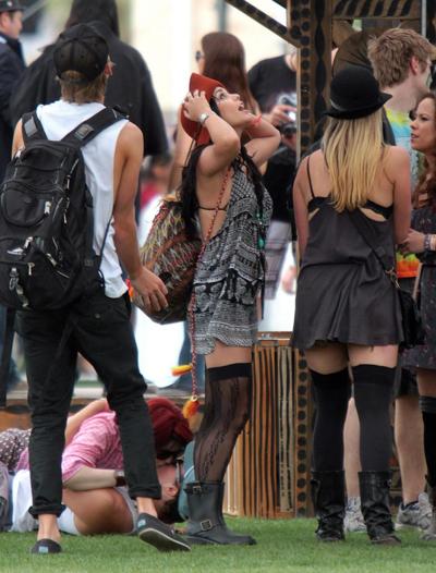 10P Vanessa Hudgens upskirt wearing a mini skirt  stockings at Coachella Music Festi