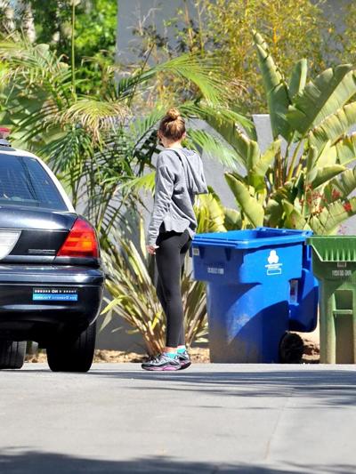 16P Miley Cyrus showing off her ass in tights after a workout in Hollywood