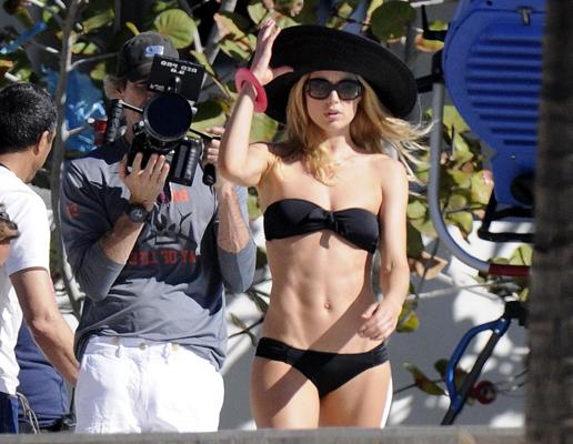 16P Doutzen Kroes in sexy black bikini doing a photoshoot in Miami Beach