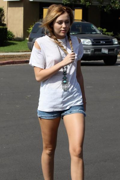 16P Miley Cyrus braless wearing see through T-shirt outside Patty's Rest in Toluca L