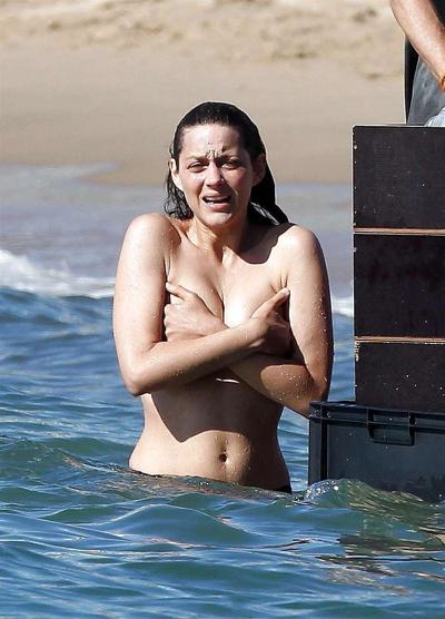 16P Marion Cotillard showing her nice big tits on beach with friend paparazzi pictur