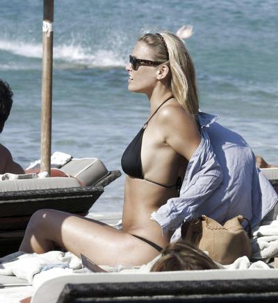 15P Bar Refaeli showing her fantastic ass in blue bikini and playing on beach