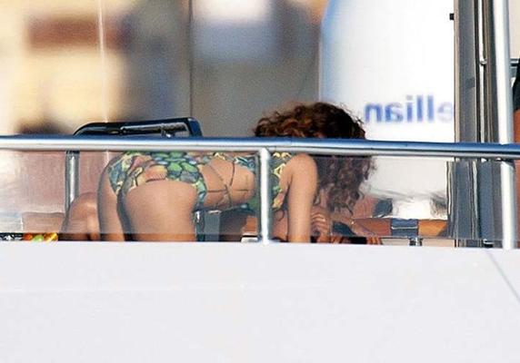 16P Rihanna exposing her sexy body and hot ass in blue bikini on yacht