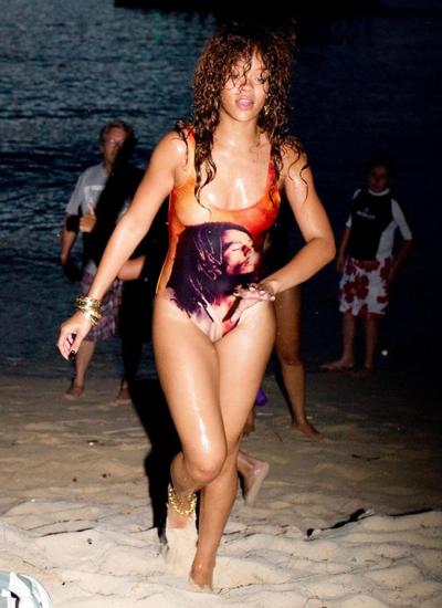 16P Rihanna in sexy swimsuit going for a dusk swim in Barbados