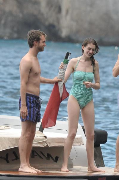 16P Anne Hathaway shows pokies wearing skimpy wet swimsuit in Italy