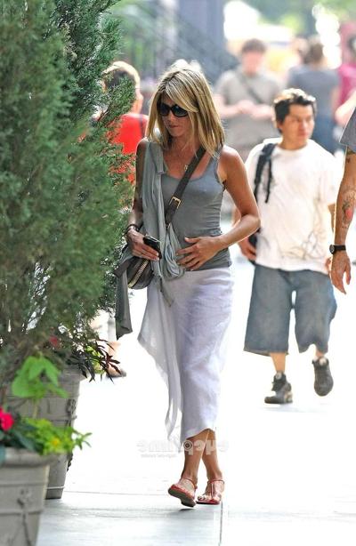 16P Jennifer Aniston exposing her sexy body and nice legs in see thru dress