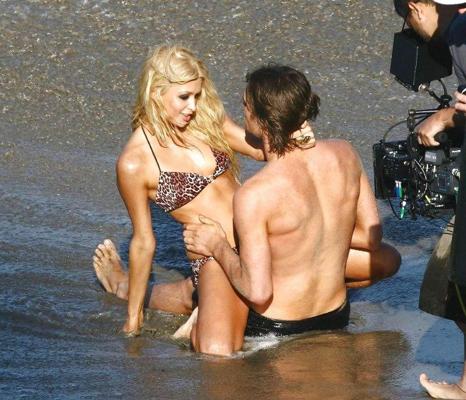 16P Paris Hilton in black stockings and showing her panties and making out wiht some