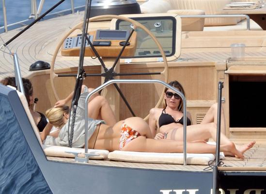 16P Bar Refaeli showing off her bikini body on a yacht in Cannes