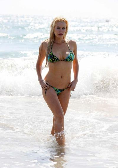 16P Sophie Monk exposing her nice big boobs and looking sexy in bikini on beach papa