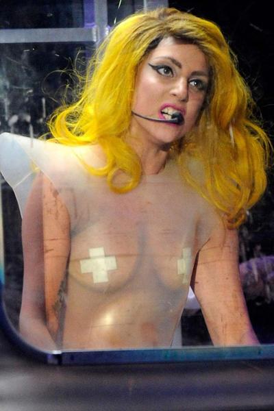 16P Lady Gaga showing panties and her tits in see thru dress paparazzi pictures