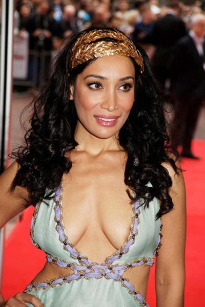 16P Sofia Hayat showing her ass in low cut dress and big cleavage paparazzi pictures