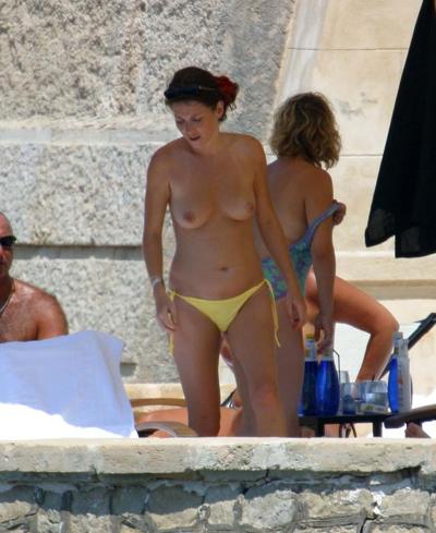 10P Anna Friel showing her nice big boobs and flashing panties upskirt in car