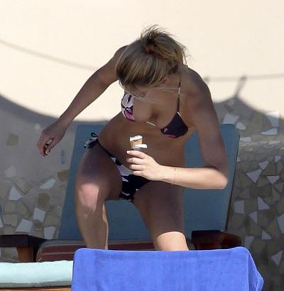 16P Bar Refaeli exposing her sexy body and hot ass in bikini on pool