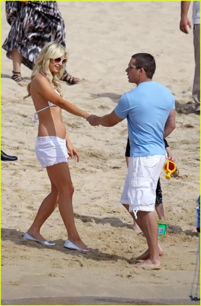 16P Paris Hilton wearing sexy white bikini  see-through shorts at the beach in Cabo 