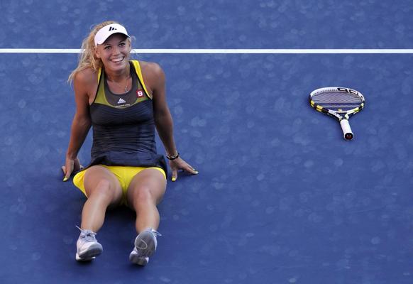 15P Caroline Wozniacki showing cameltoe in sweaty yellow panties at The US Open