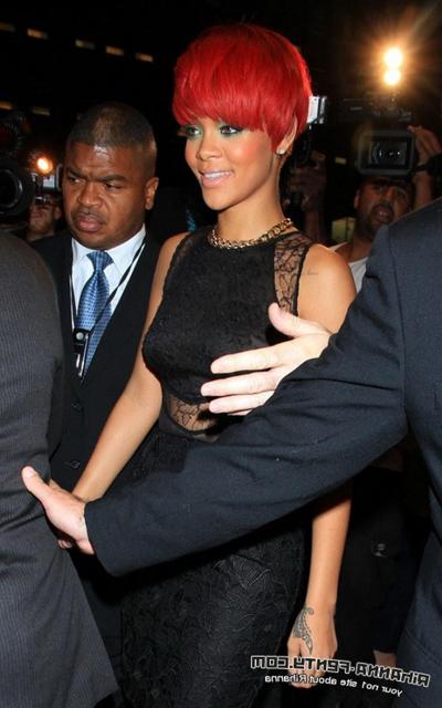15P Rihanna showing off her boobs in black see-through dress