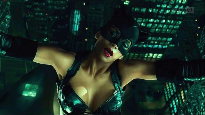 10P Halle Berry showing big cleavage and looking hot in outfit on movie