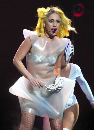 16P Lady Gaga as Vampirella in lingerie showing bloody cleavage on stage