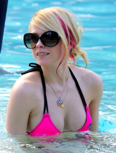 16P Avril Lavigne exposing her sexy body and hot tits in see thru blouse