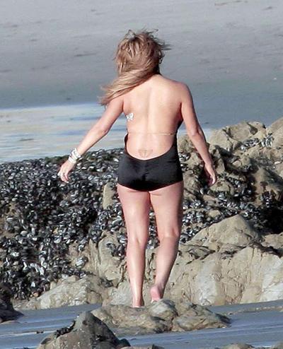 16P Mariah Carey looking sexy in bikini and showing big tits