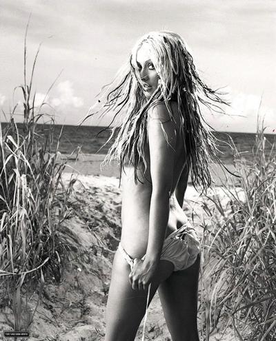 16P Christina Aguilera shooting for some magazine in thong and showing naked tits