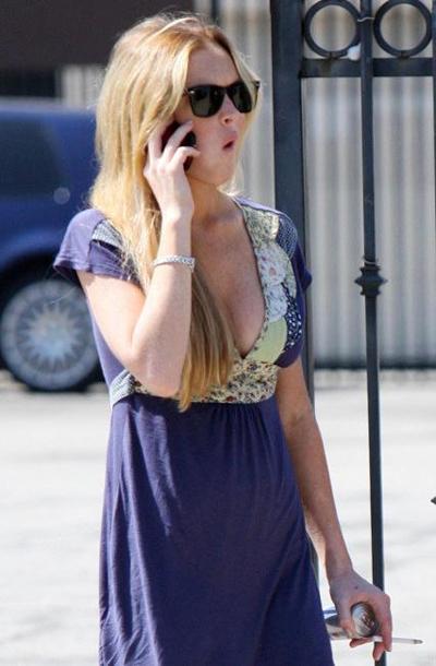 16P Lindsay Lohan juicy boobs in see through moment