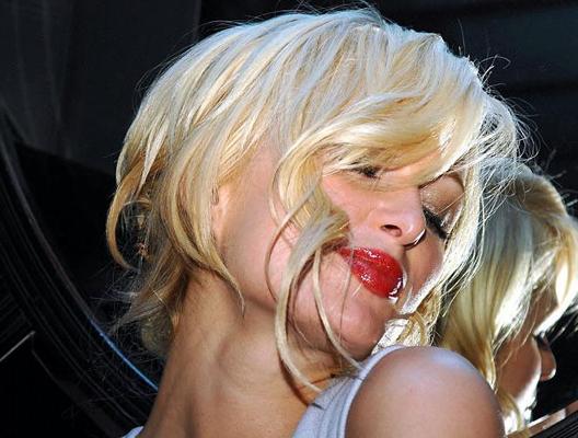 10P Paris Hilton showing her nice tits and ass crack on beach paparazzi pictures