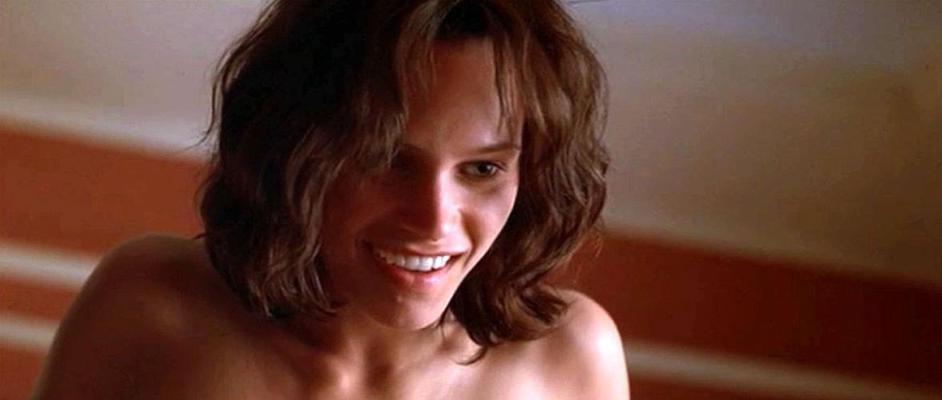 16P Natasha Henstridge showing her big tits in nude movie caps