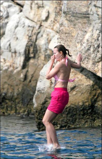 16P Carole Bouquet showing her nice big tits on boat