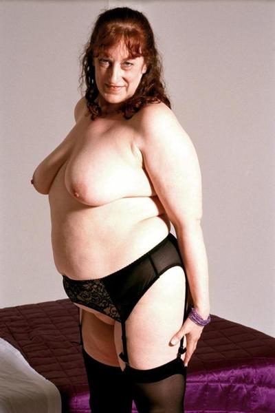 20P Strip teasing fat mature loves spreading her shaved pussy