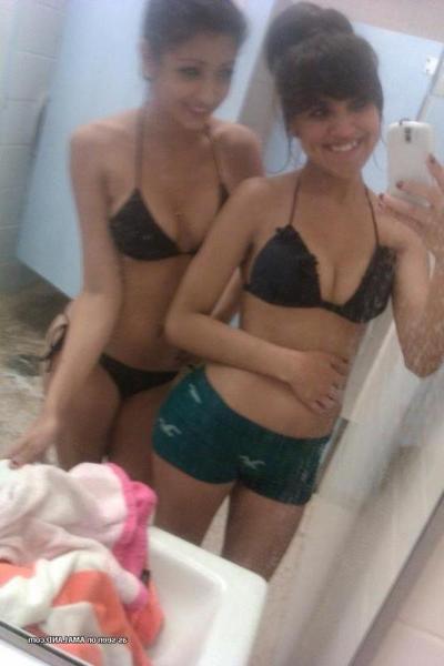 14P Kinky bikini teens camwhoring in a beach resort's bathroom