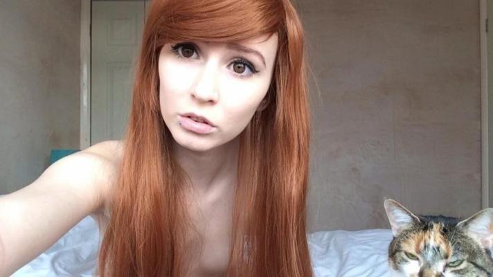 14P Naughty cocktease with body piercings posing naked