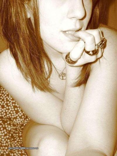9P Gallery of a sexy inked honey flashing her tits at home